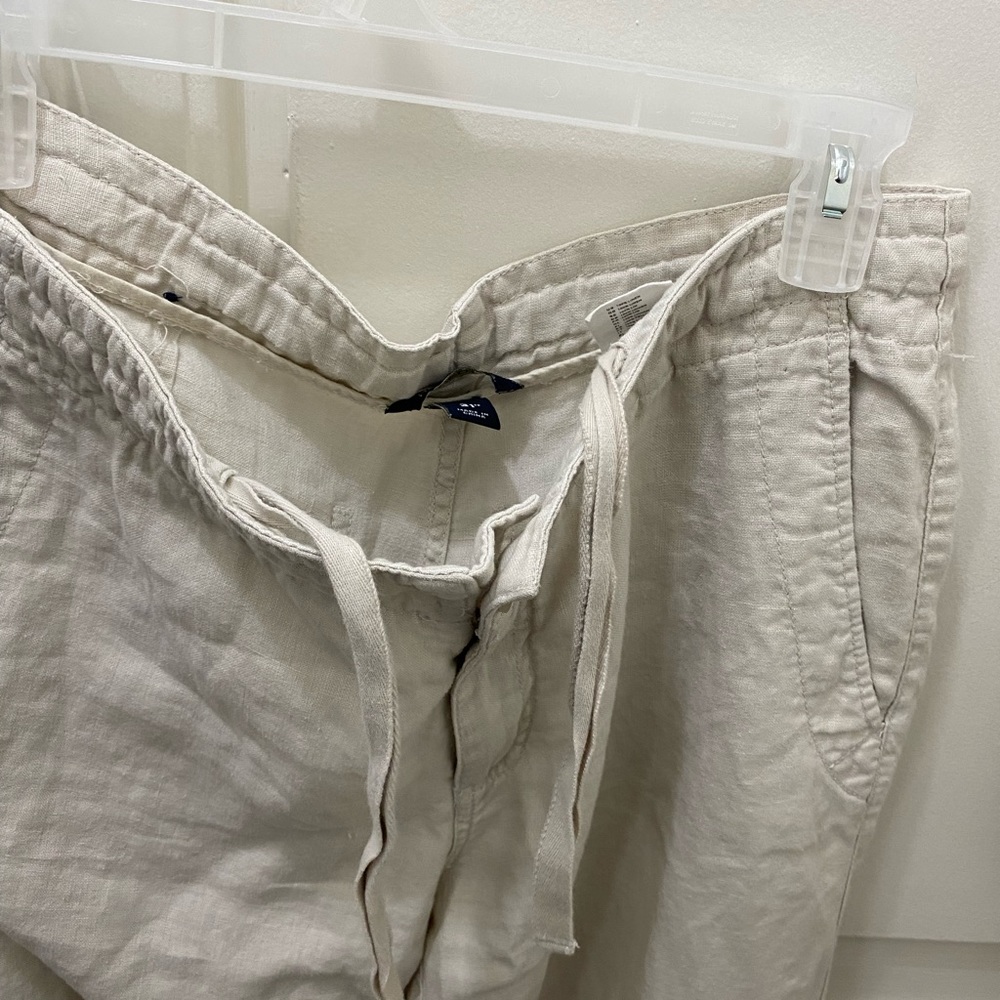 H&M Linen cargo pants. Draw strings at ankles and waist.
